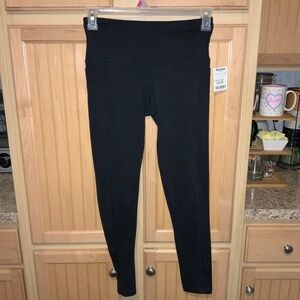 Women’s black leggings, new with tag size large
